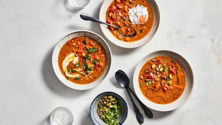 creamy lentil stew topped with fried egg