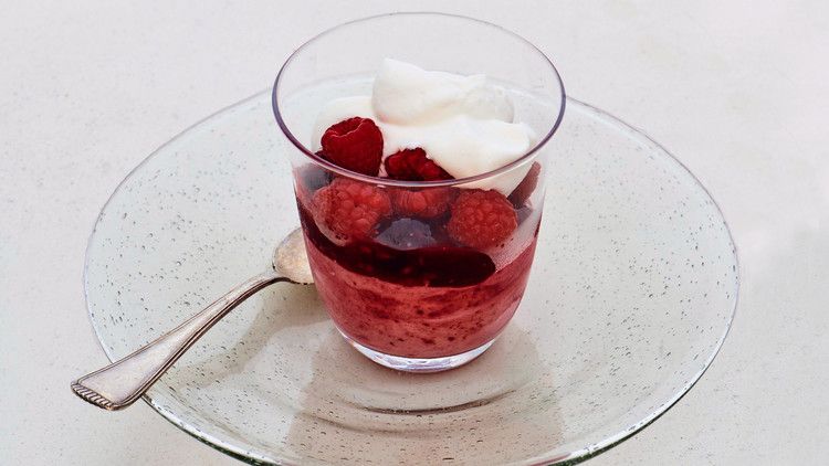 cherry-raspberry semifreddo topped with whipped cream
