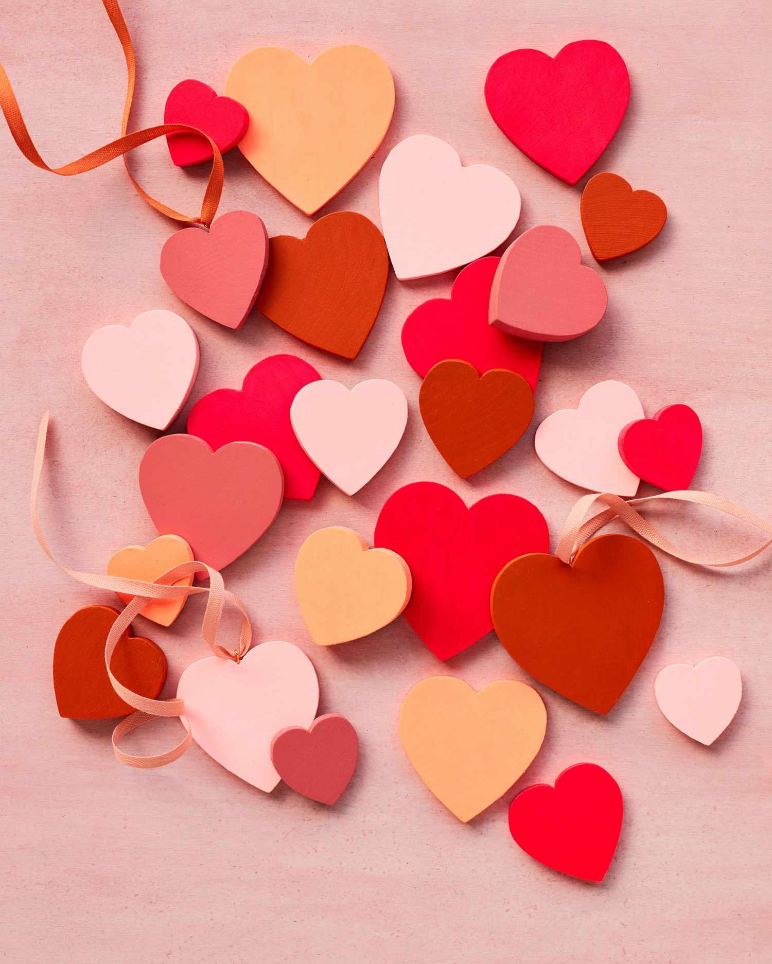 flat wooden hearts in red pink white