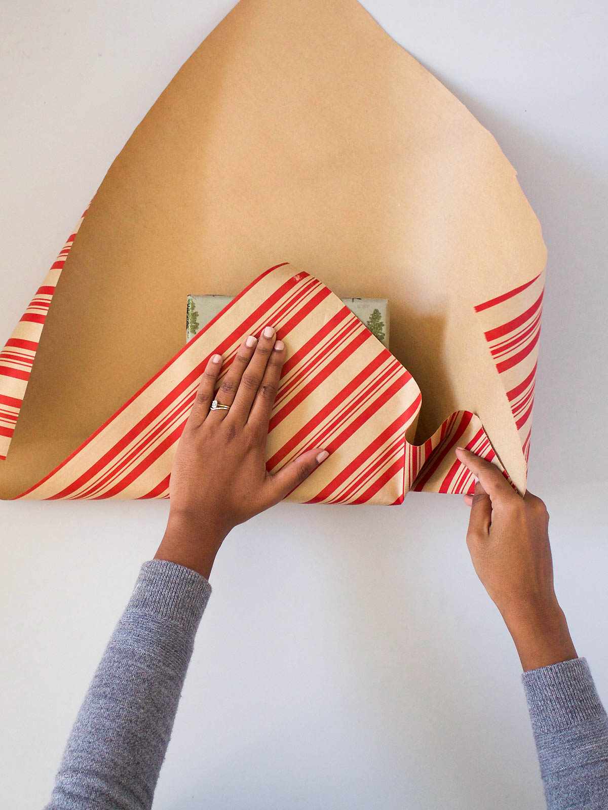 Person wrapping gift
