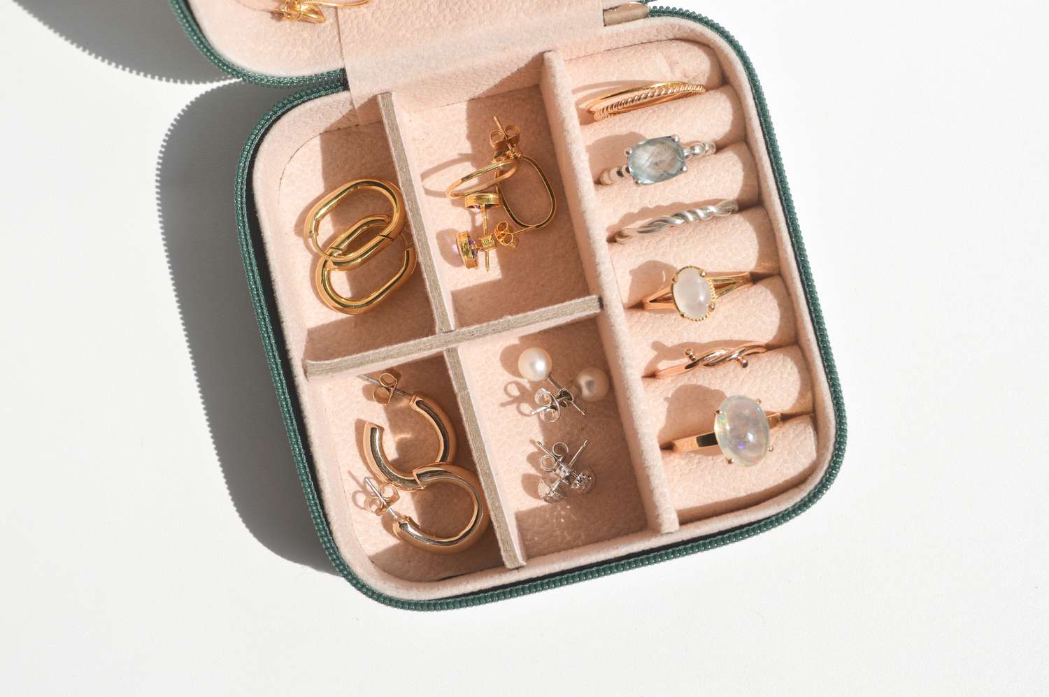 Gold and silver jewelry collection in a box. 