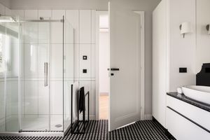 White and black bathroom with shower