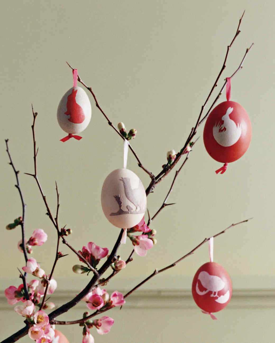 Easter eggs hanging from branch