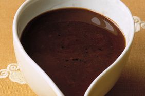 lamb pan sauce in white gravy boat