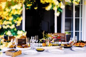 Tablescape prepared for outdoor summer dinner party