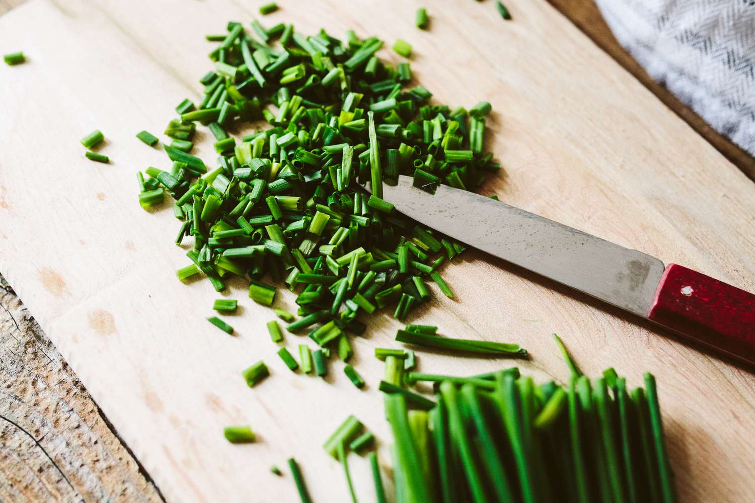 Chives on cutting board