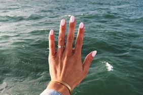 engagement ring selfie seascape