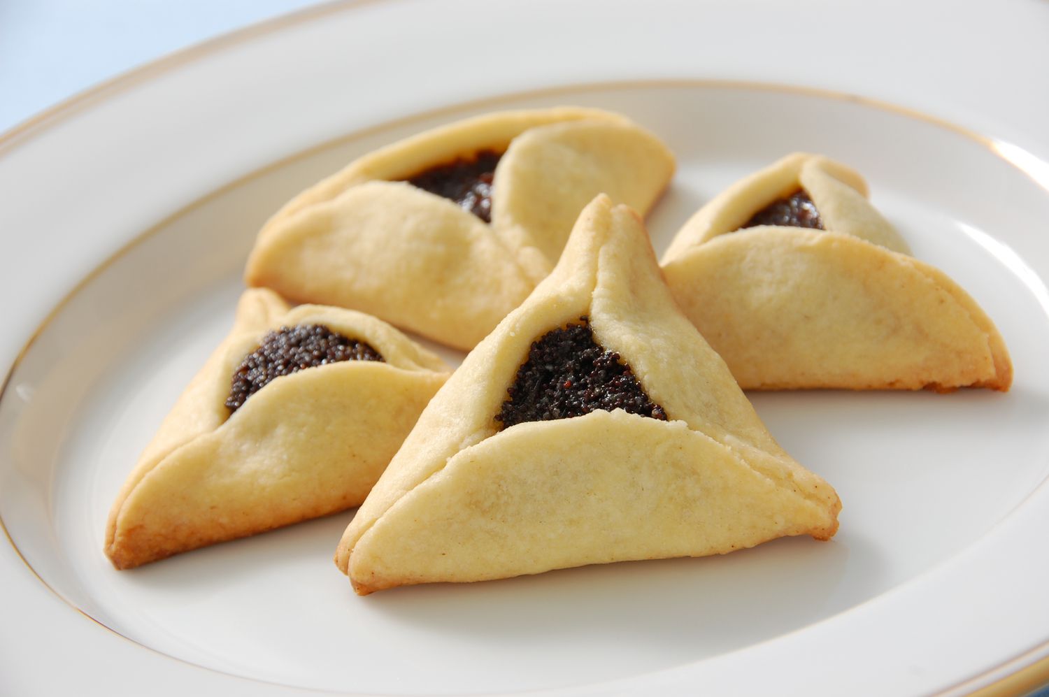 poppy seed hamantaschen on plate