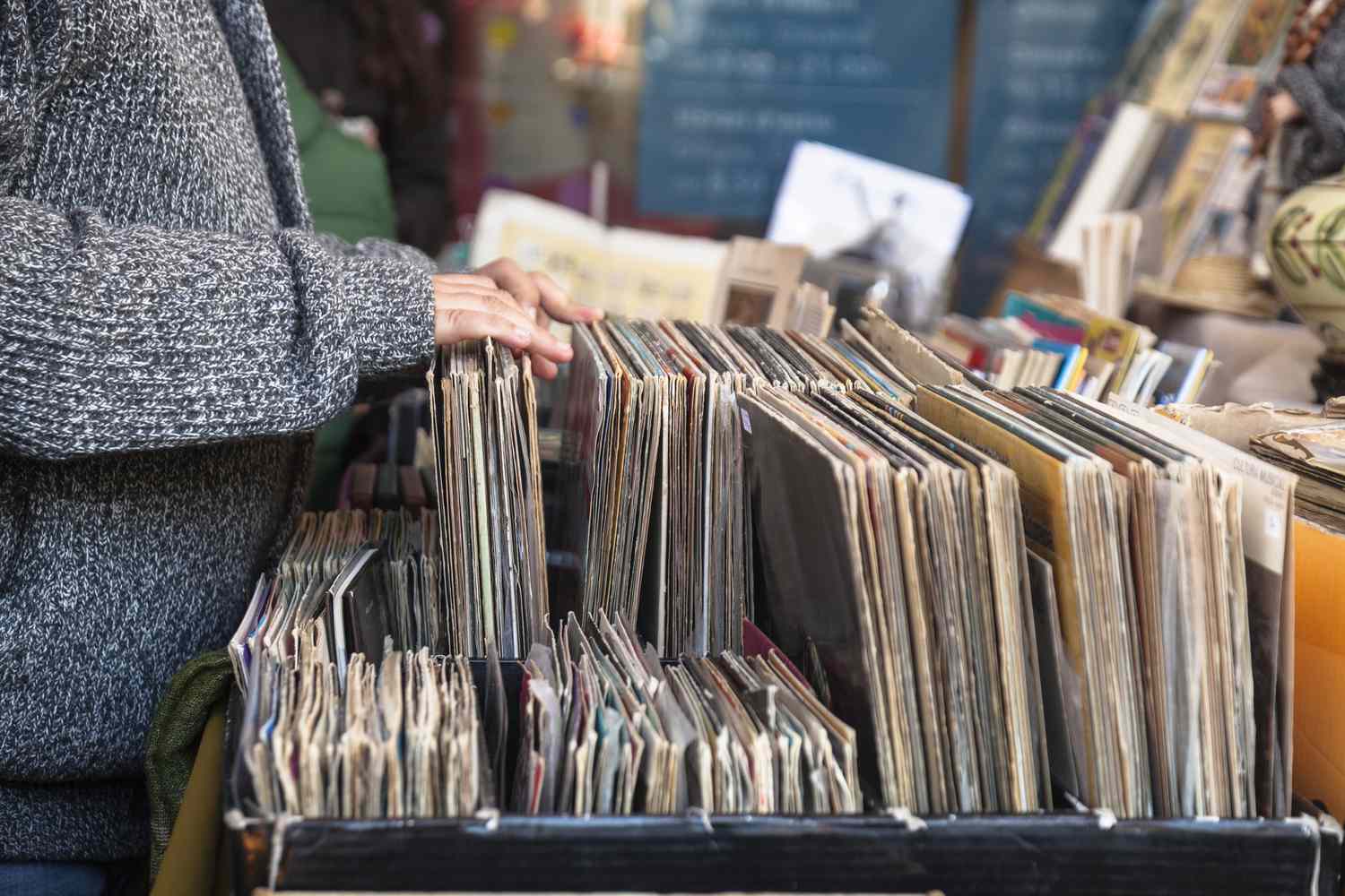Browsing through vinyl records at flea market