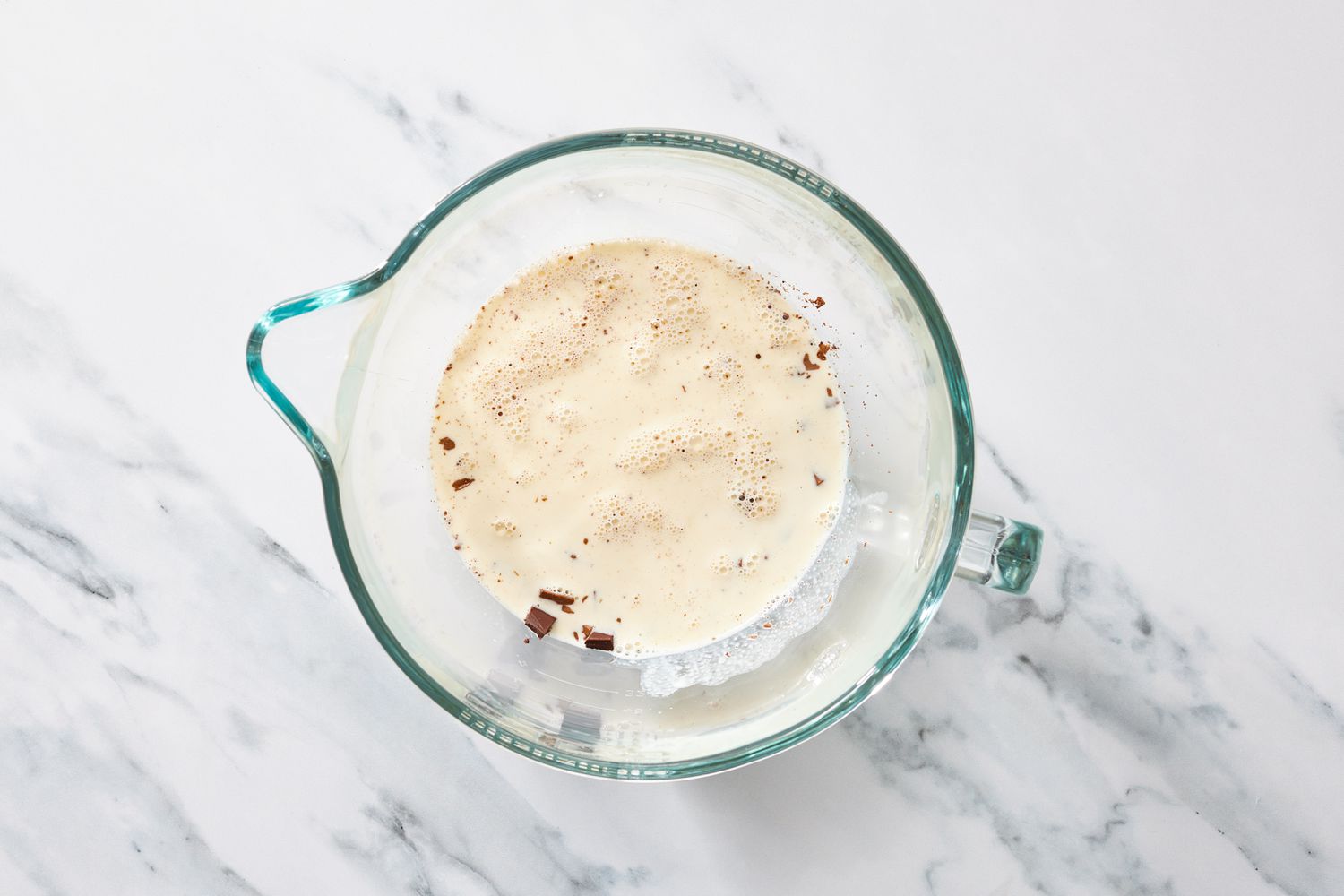 Cream and chocolate in glass bowl