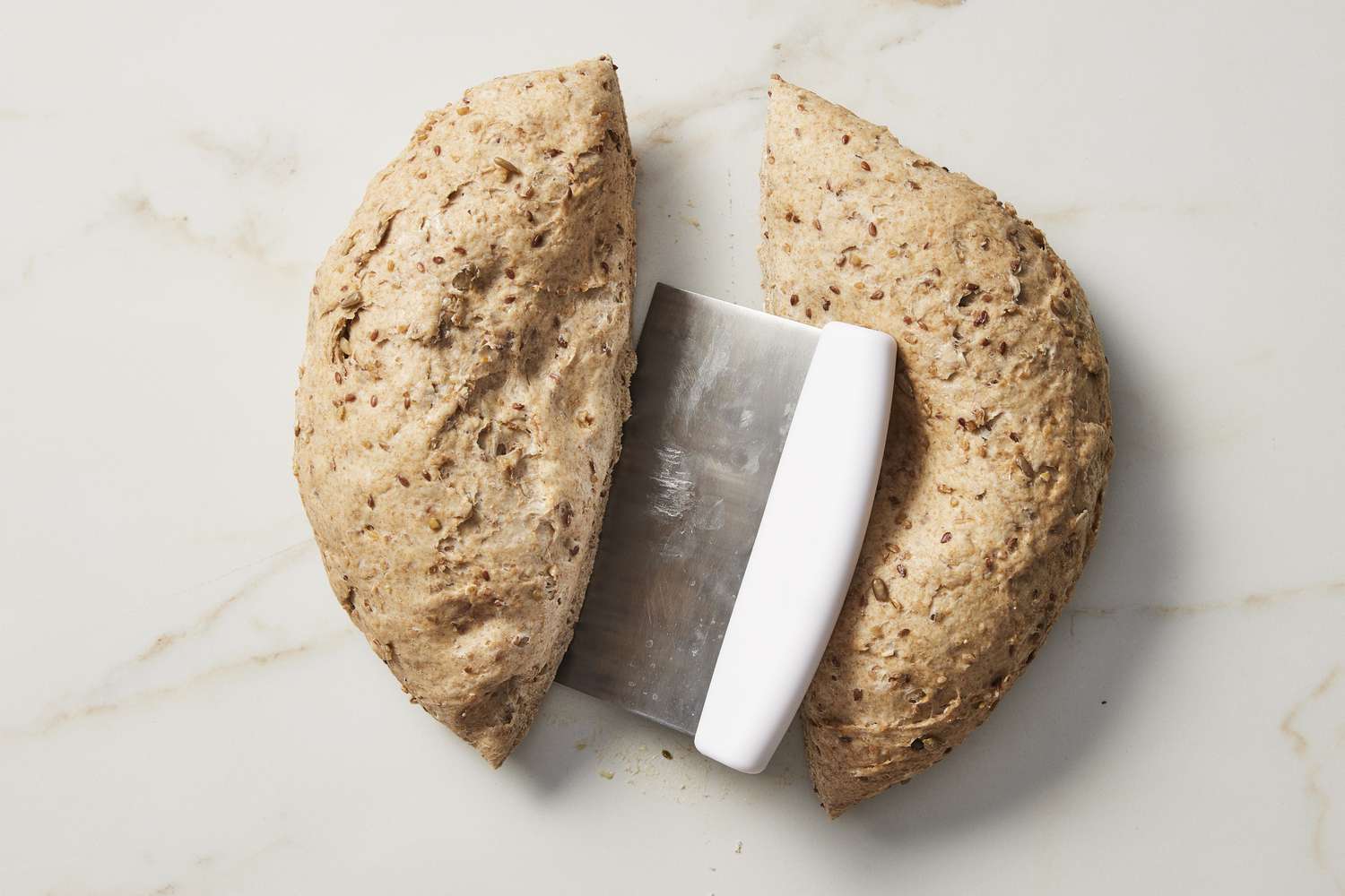 Multigrain dough being cut