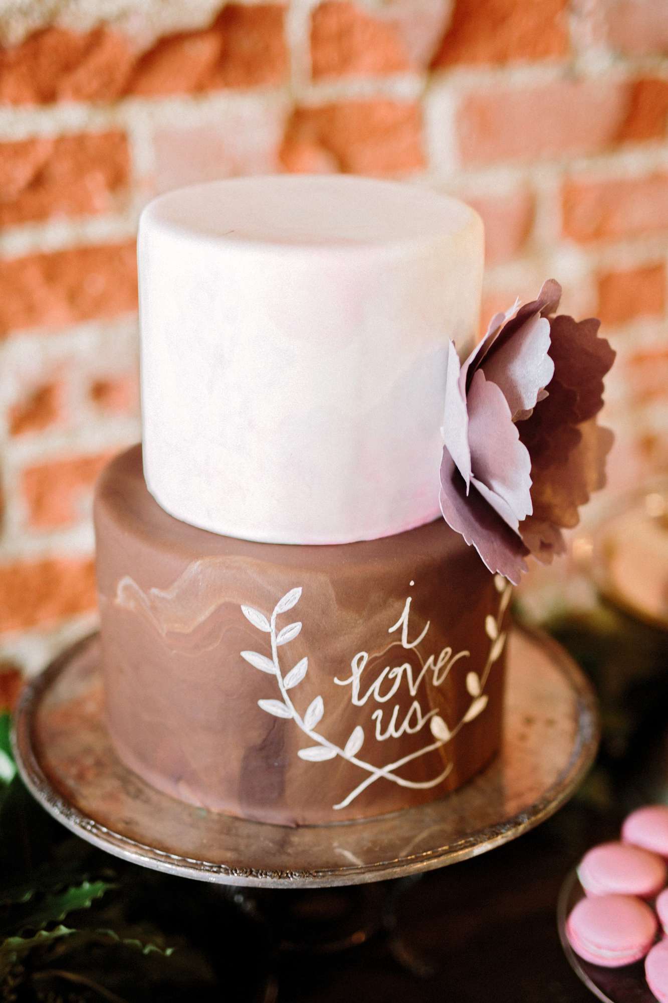 simple two-tiered cake with writing