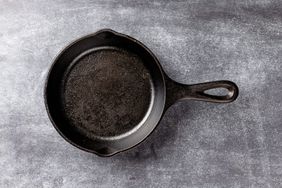 cast iron skillet on slate surface
