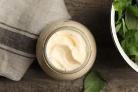 jar of mayonnaise on wooden table