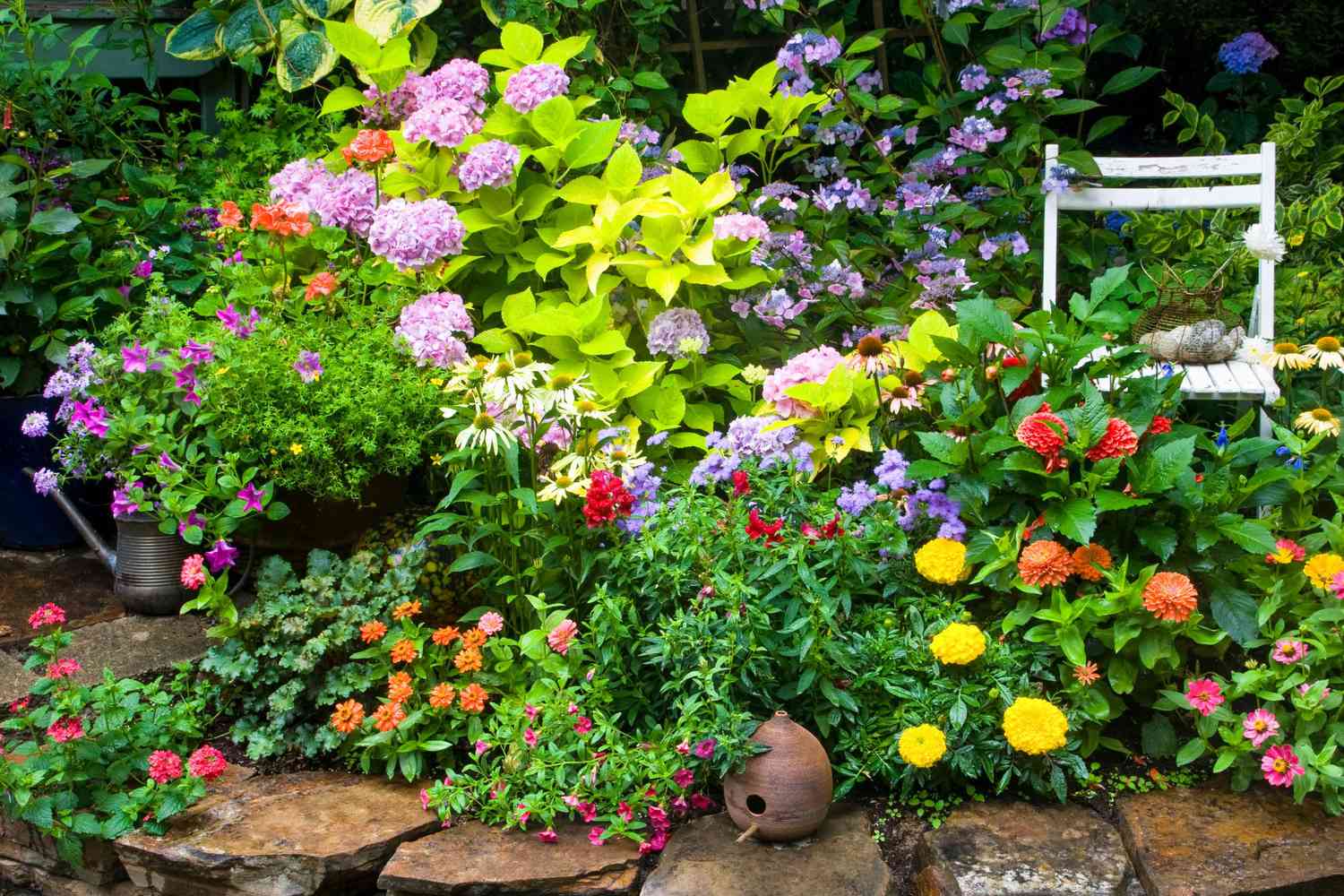 abundant spring flower garden with clean flower beds