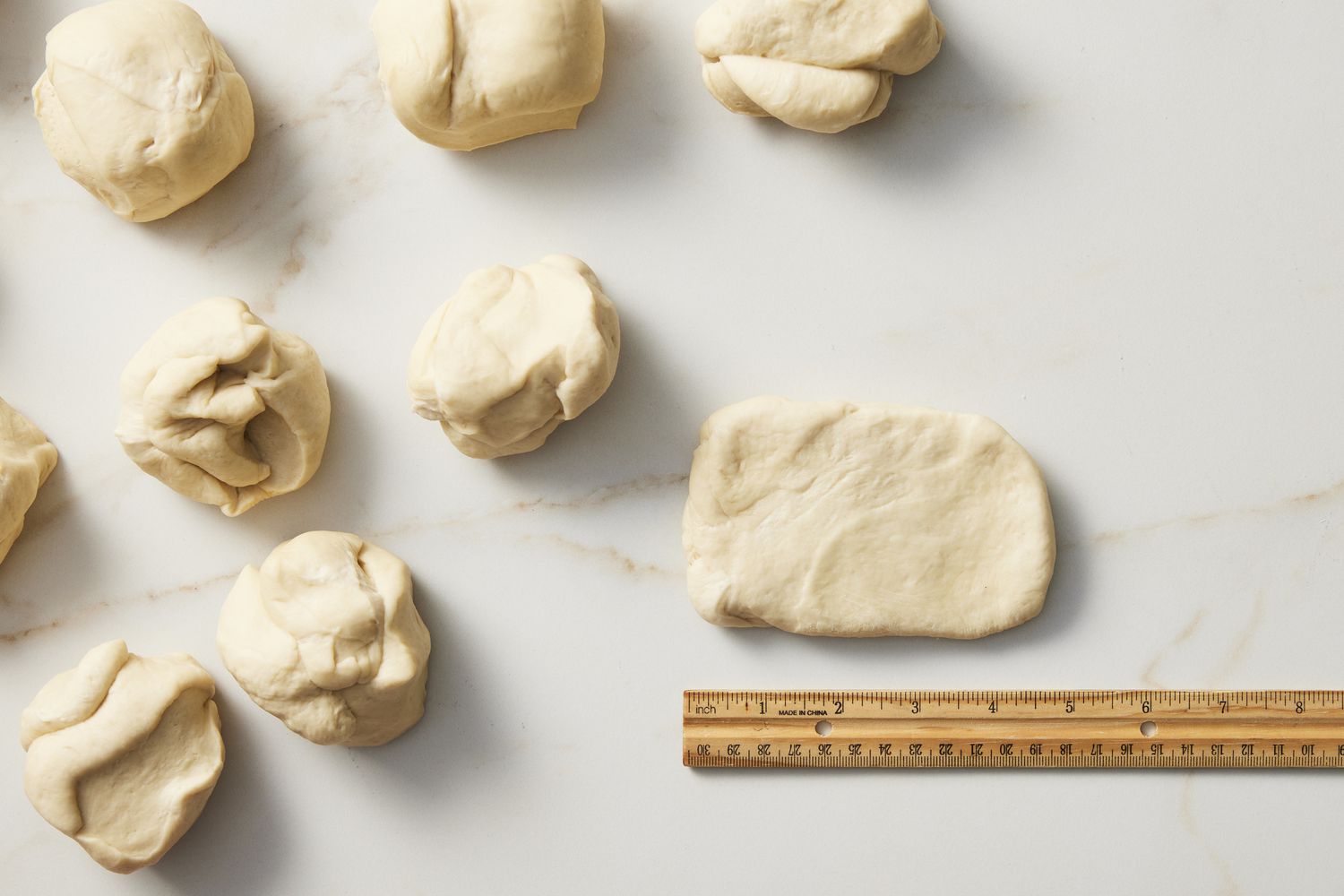 Dough pieces and dough rectangle with ruler