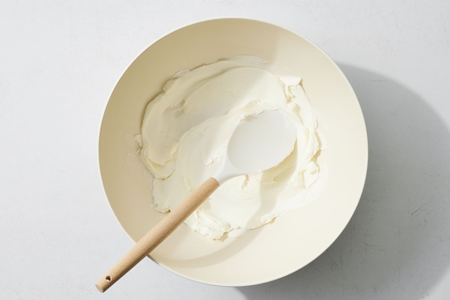 Overhead view of frosting in a bowl