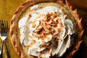 double-coconut cream pie on gold table cloth
