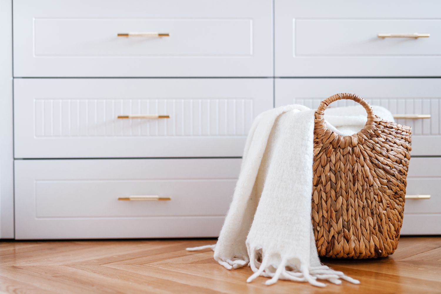 throw blanket in a wicker basket