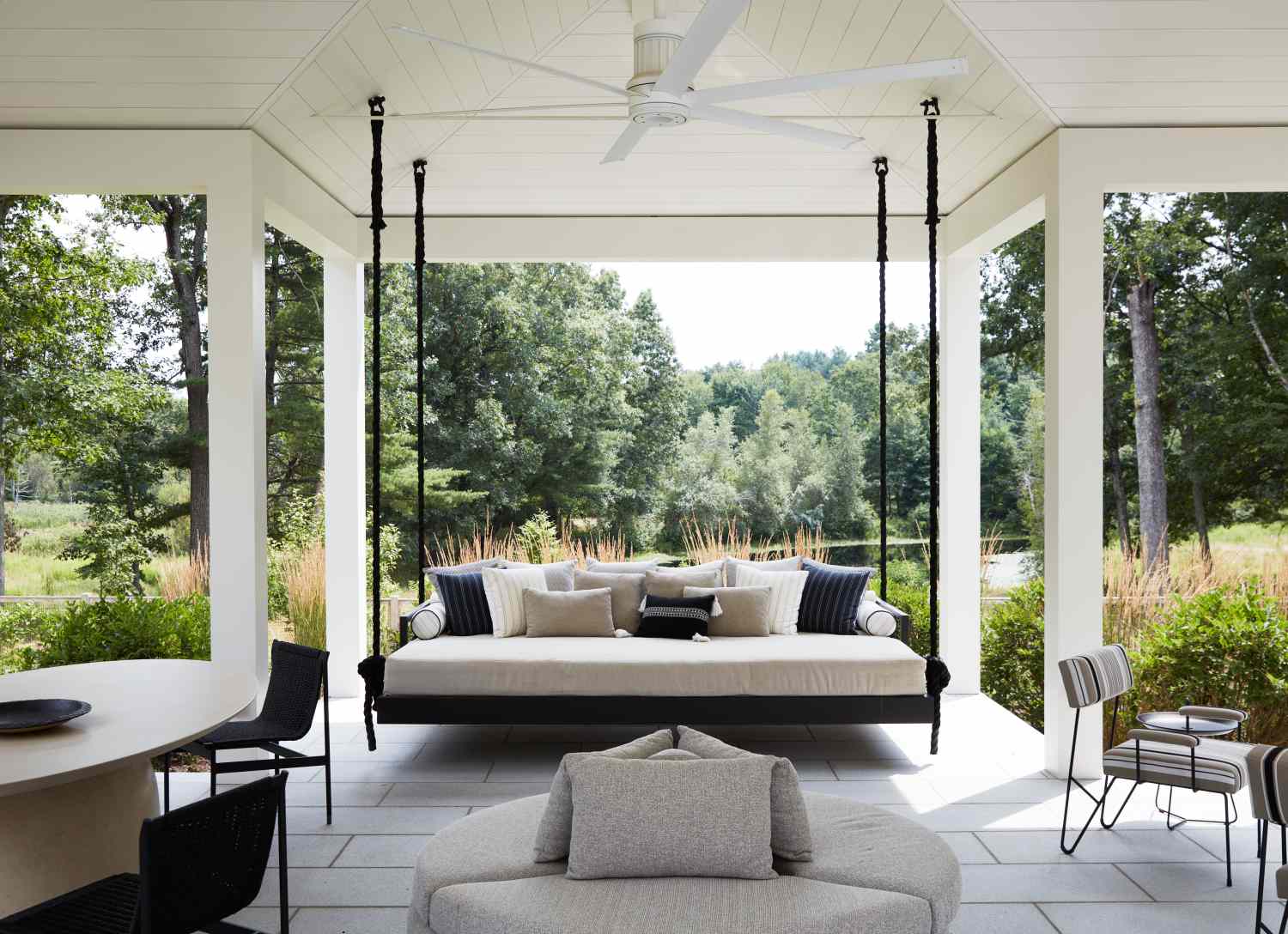 white and black porch with shiplap ceiling