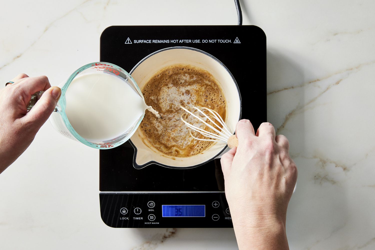 milk being added into croque monsieur mixture