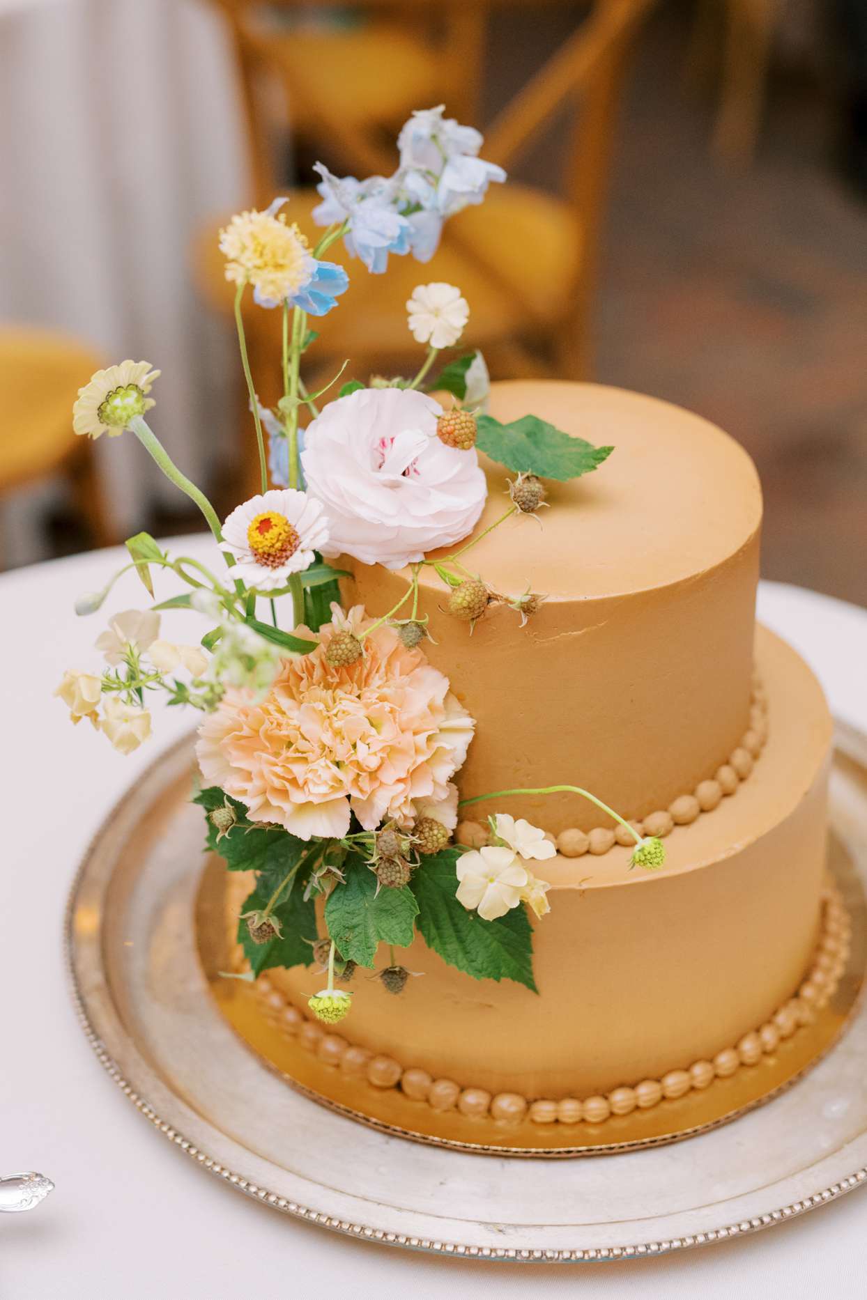 Chocolate wedding cake with golden exterior