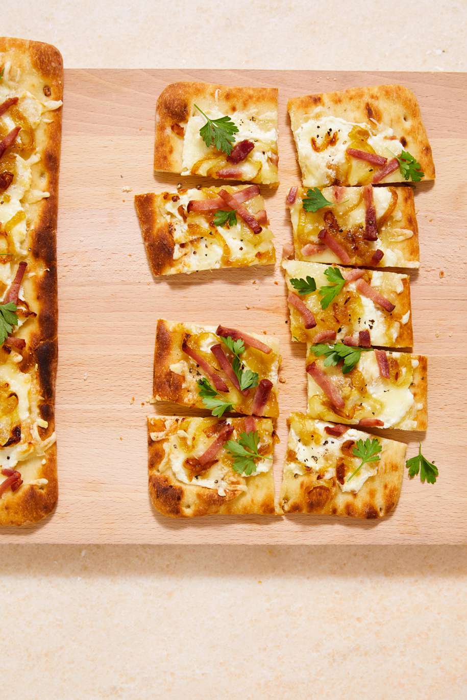 alsatian flatbread topped with flat-leaf parsley