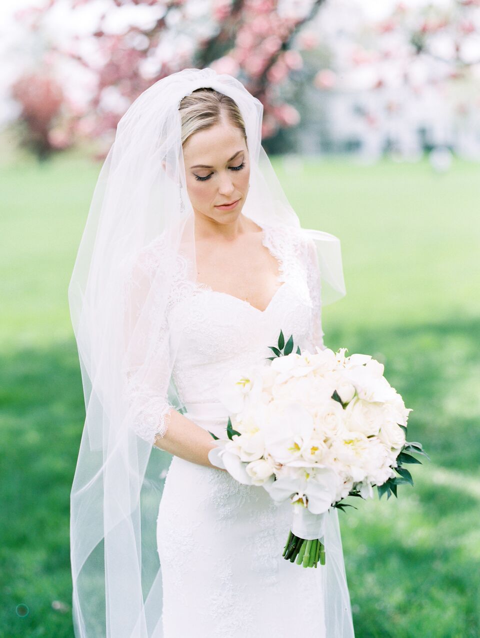 bride with white bouquet