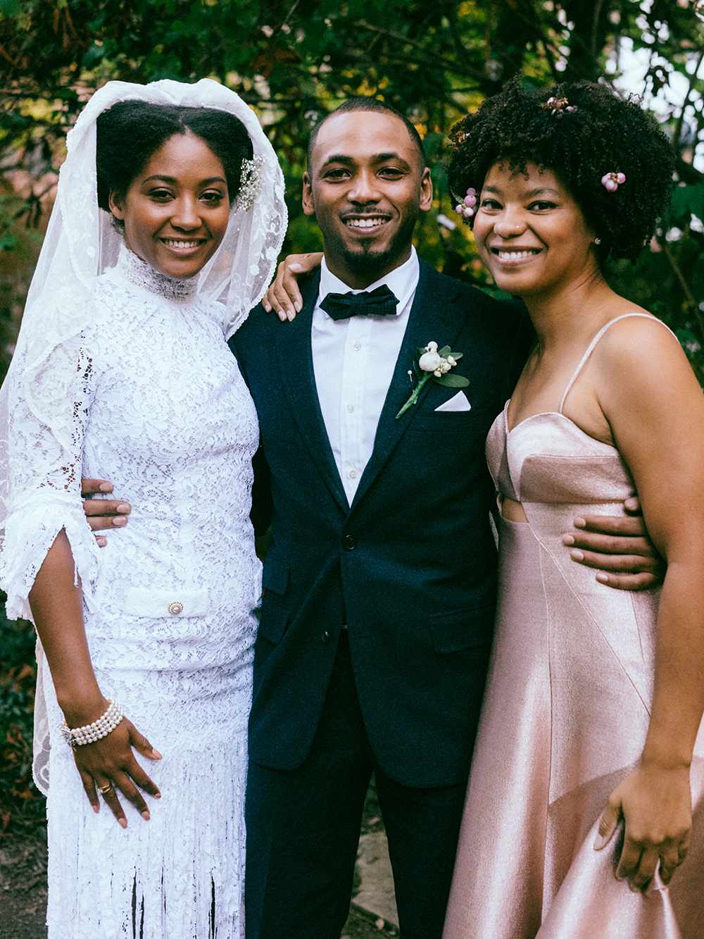 bride, groom, and bridesmaid