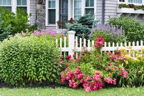 home with white picket fence