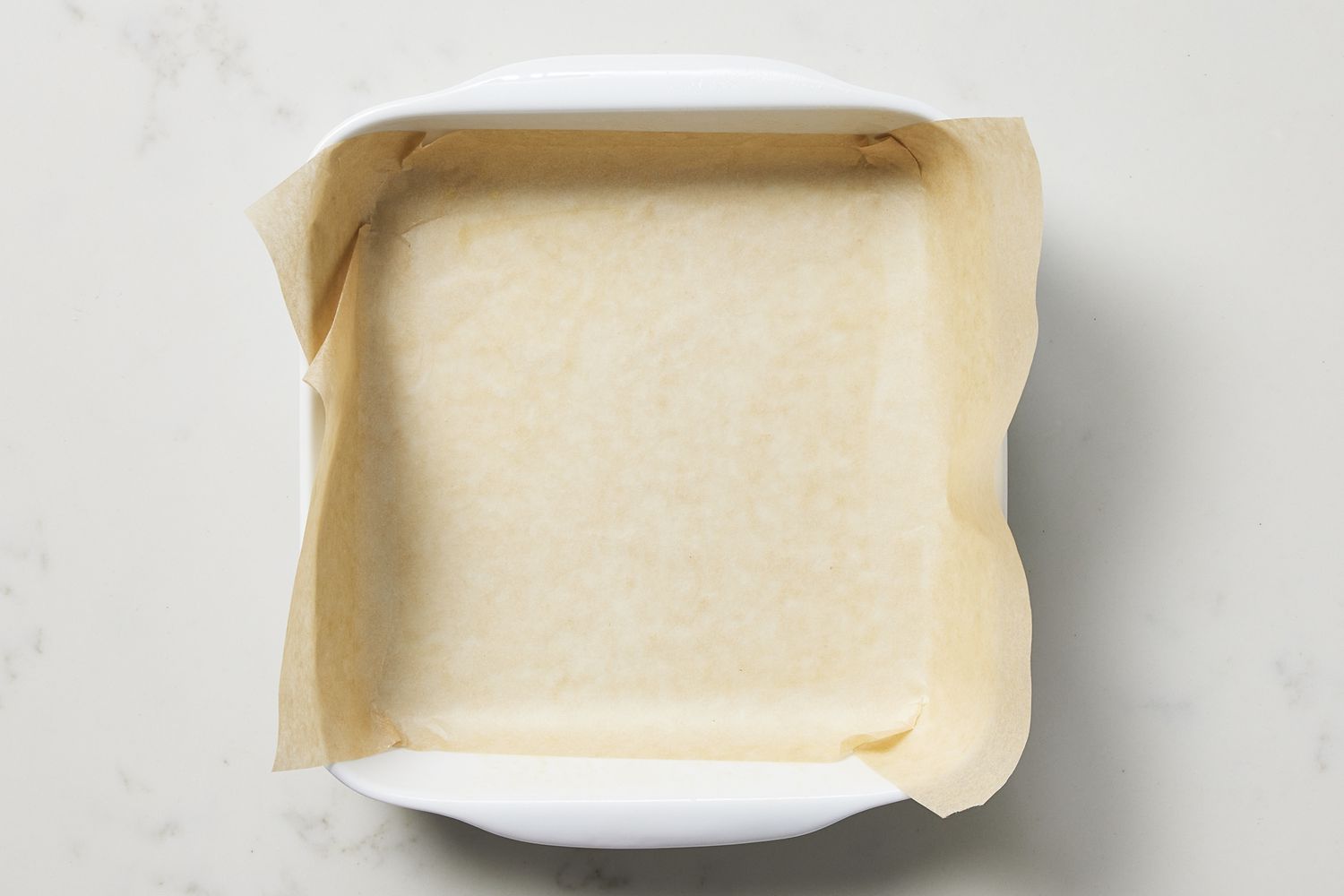 Baking pan lined with parchment paper