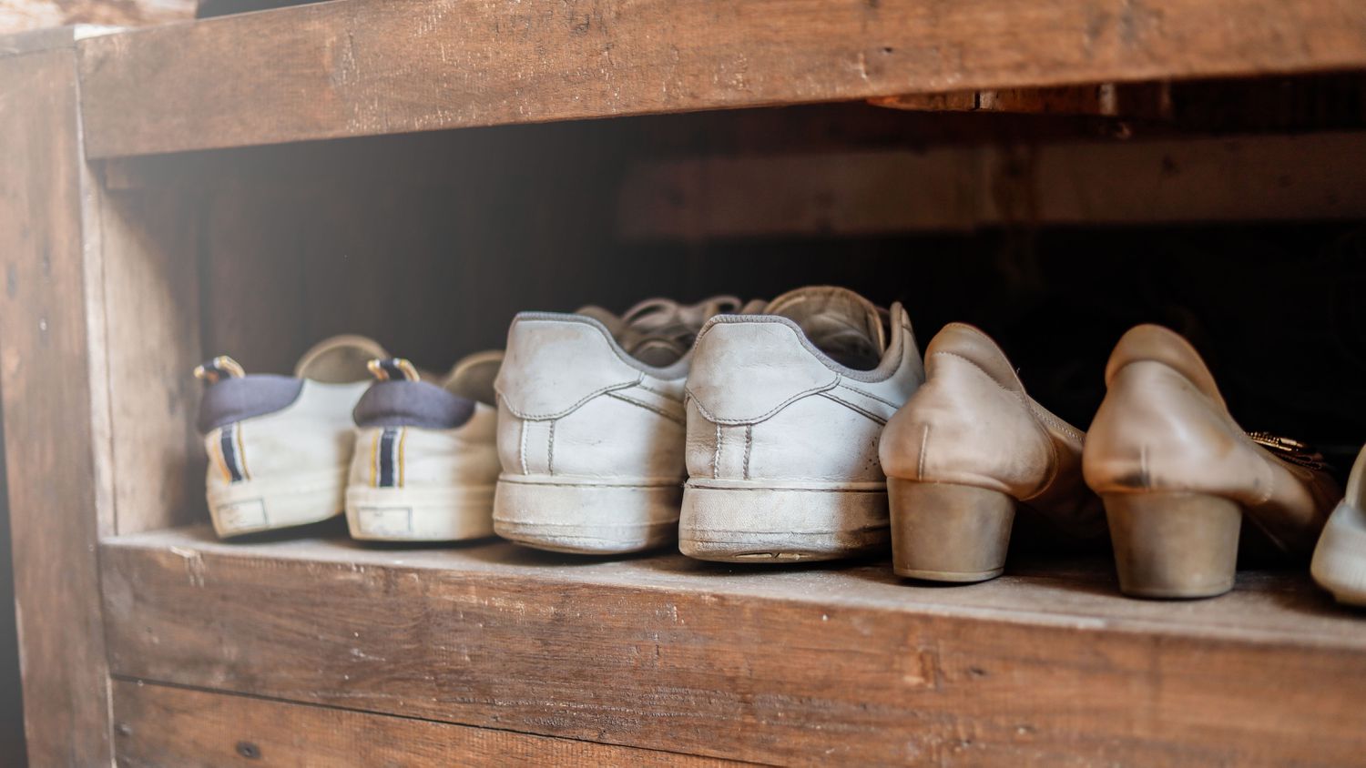 Shoes stored in wooden crate