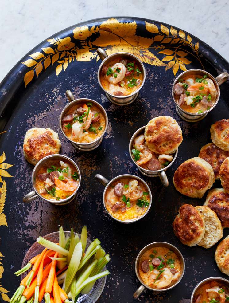 bayou la batre shrimp-and-sausage gravy served on a black plate