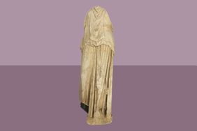 Statue on purple