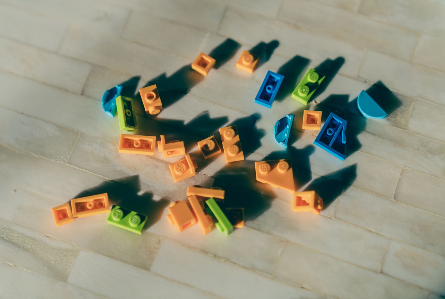 A pile of colorful legos scattered on a table