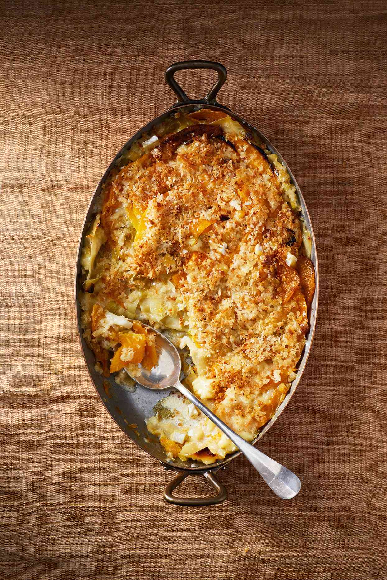 squash gratin served in a silver dish