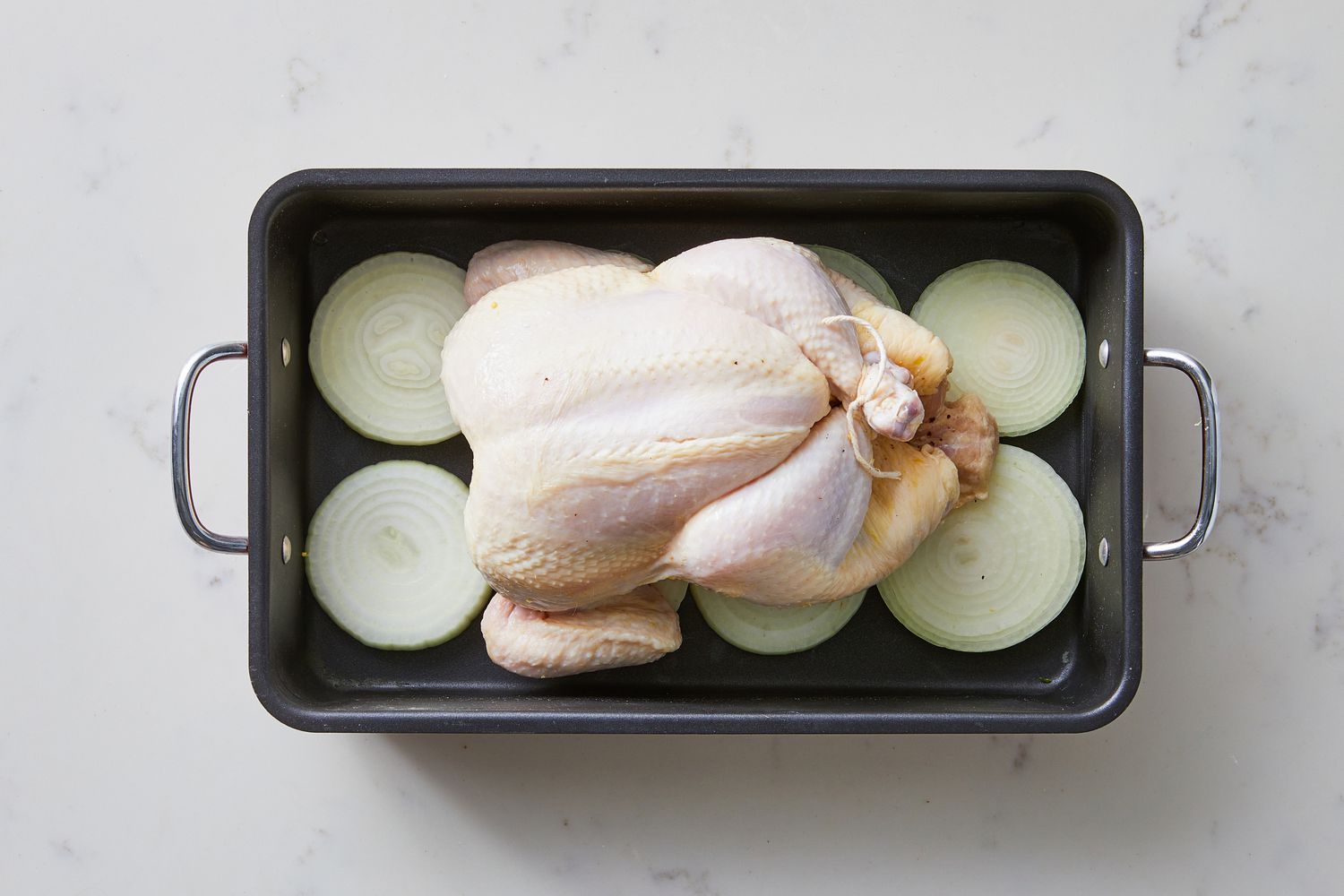 Place Chicken in Pan for Perfect Roast Chicken