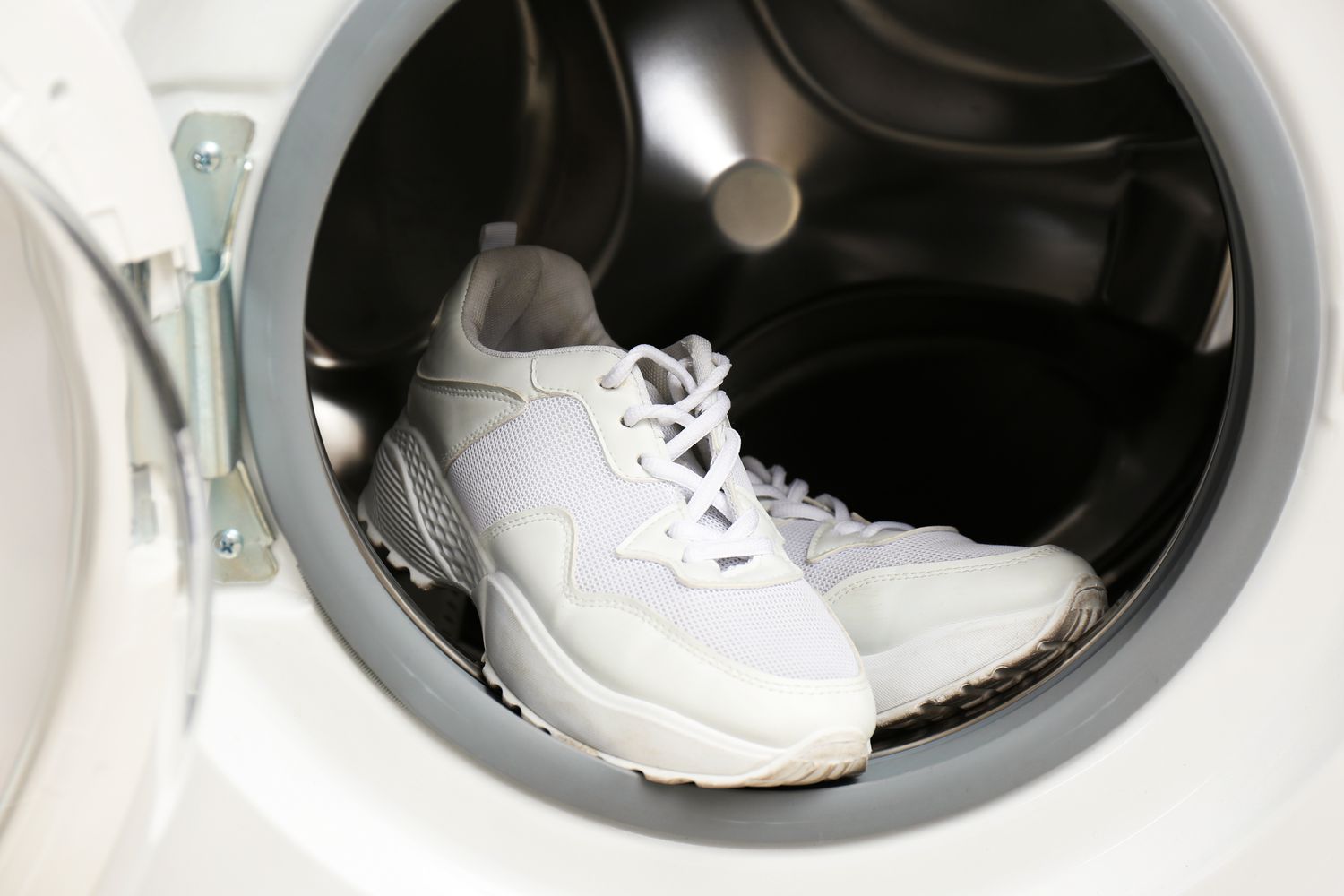 White sneakers in washing machine