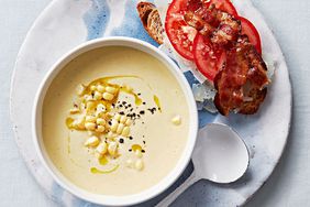 Corn soup with tomato-bacon toasts