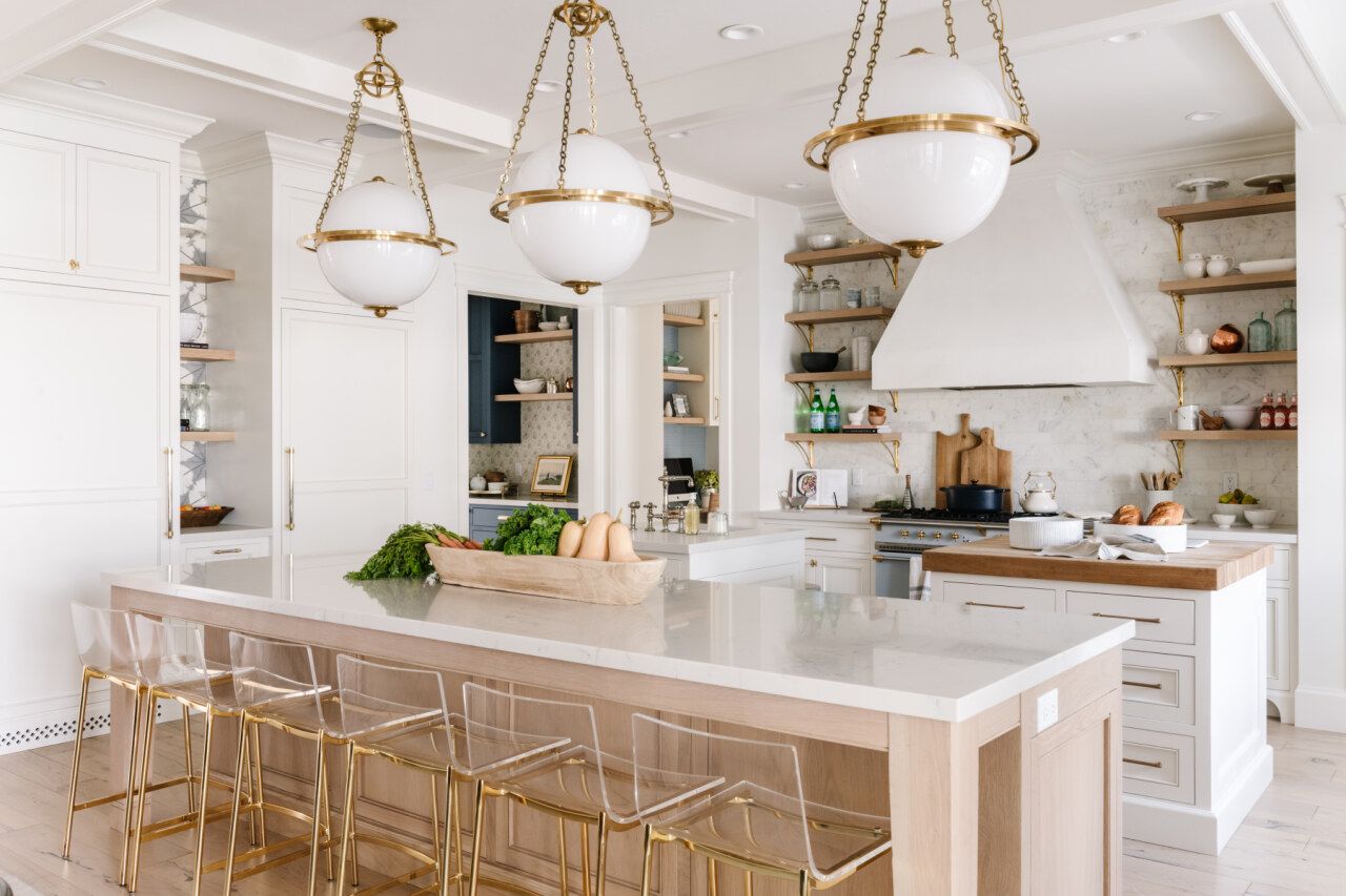 Modern kitchen with a large island pendant lighting and open shelving