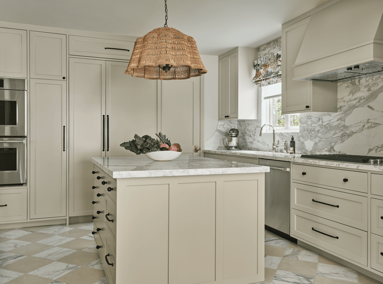 white kitchen with tile floors 