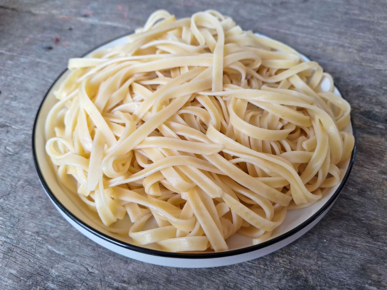 A plate filled with fettuccine pasta