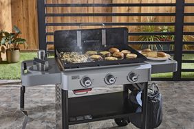 griddle grill with smash burgers cooking