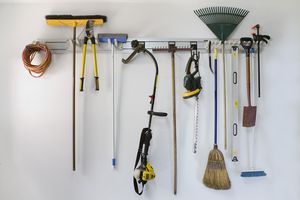 garage tools hanging on a storage rack
