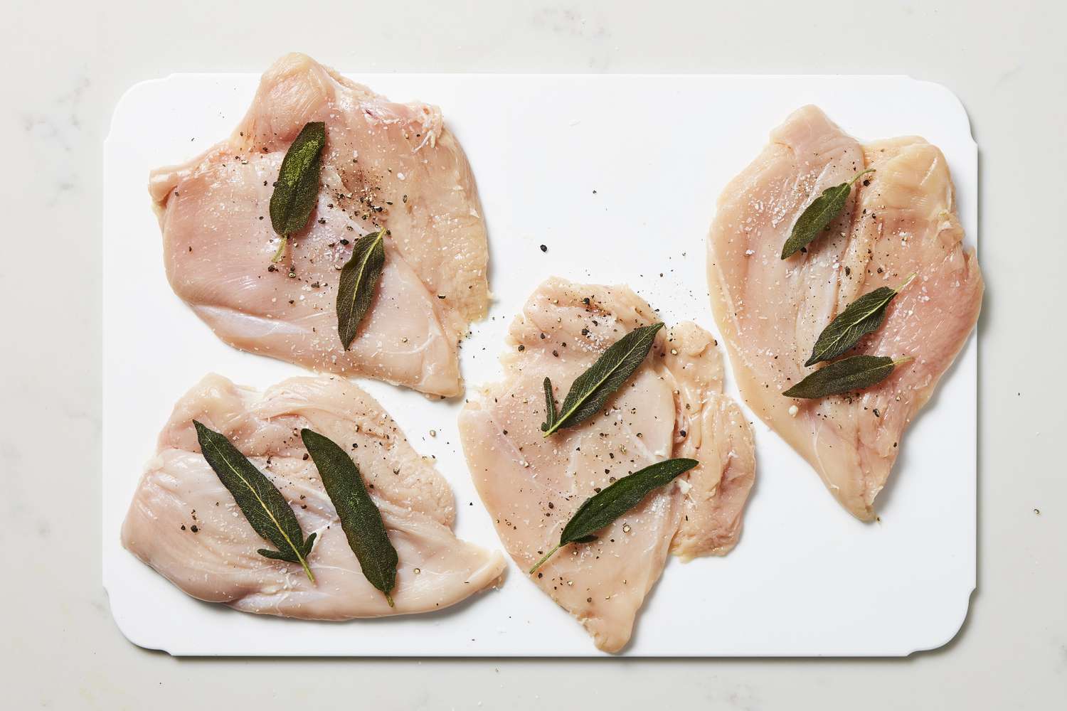 Chicken and sage leaves