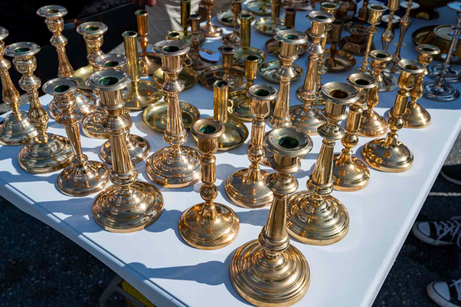 A selection of brass candleholders