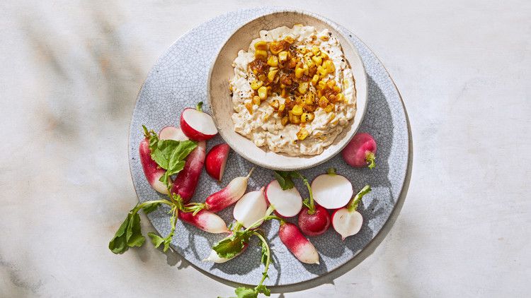 creamy corn-and-onion dip served with radishes