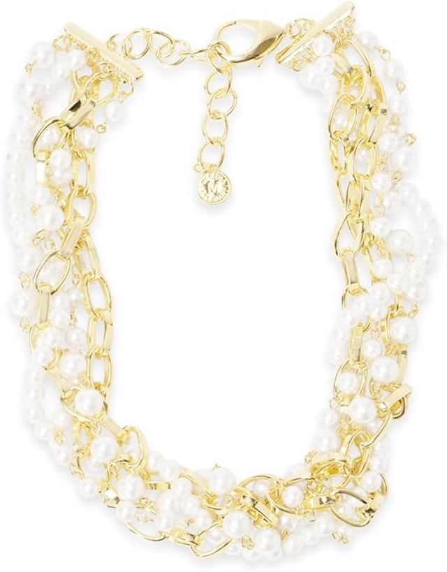 A gold and pearl layered necklace with a decorative chain design