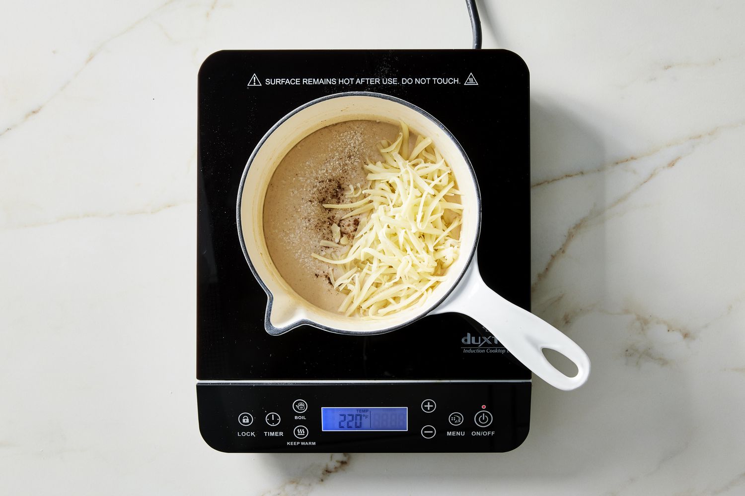 cheese and seasoning for croque monsieur in pot