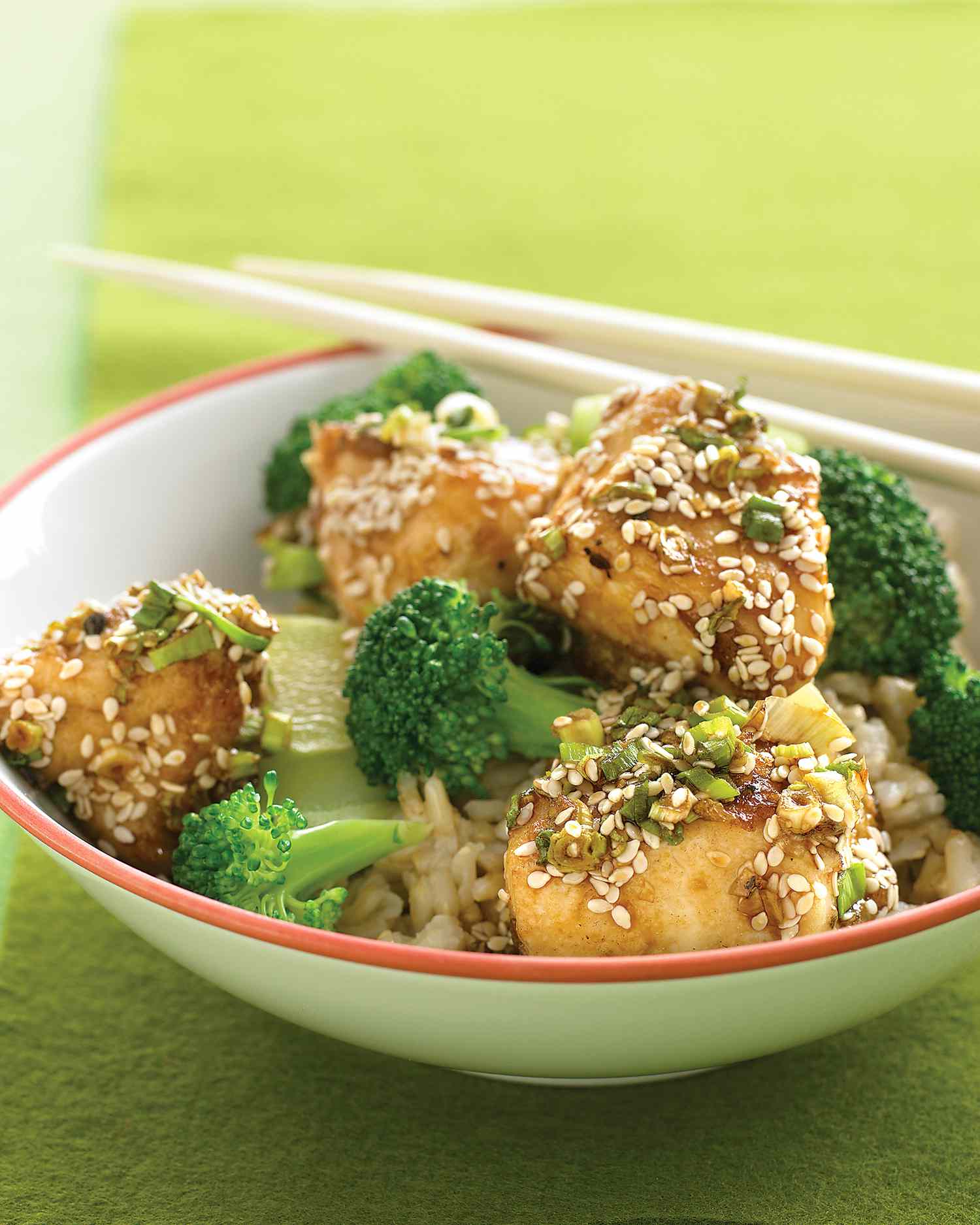 sesame chicken on green plate